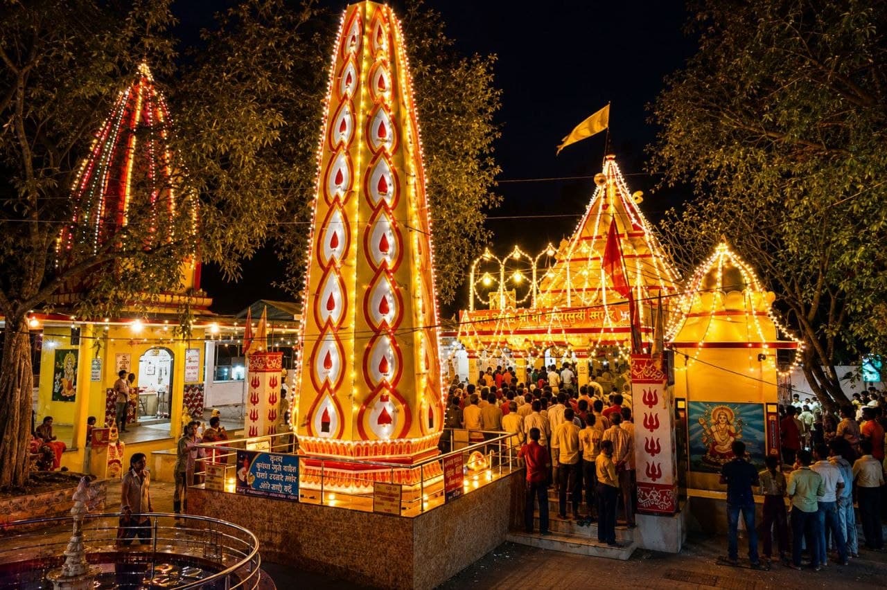 Temple illuminated during a festival evening